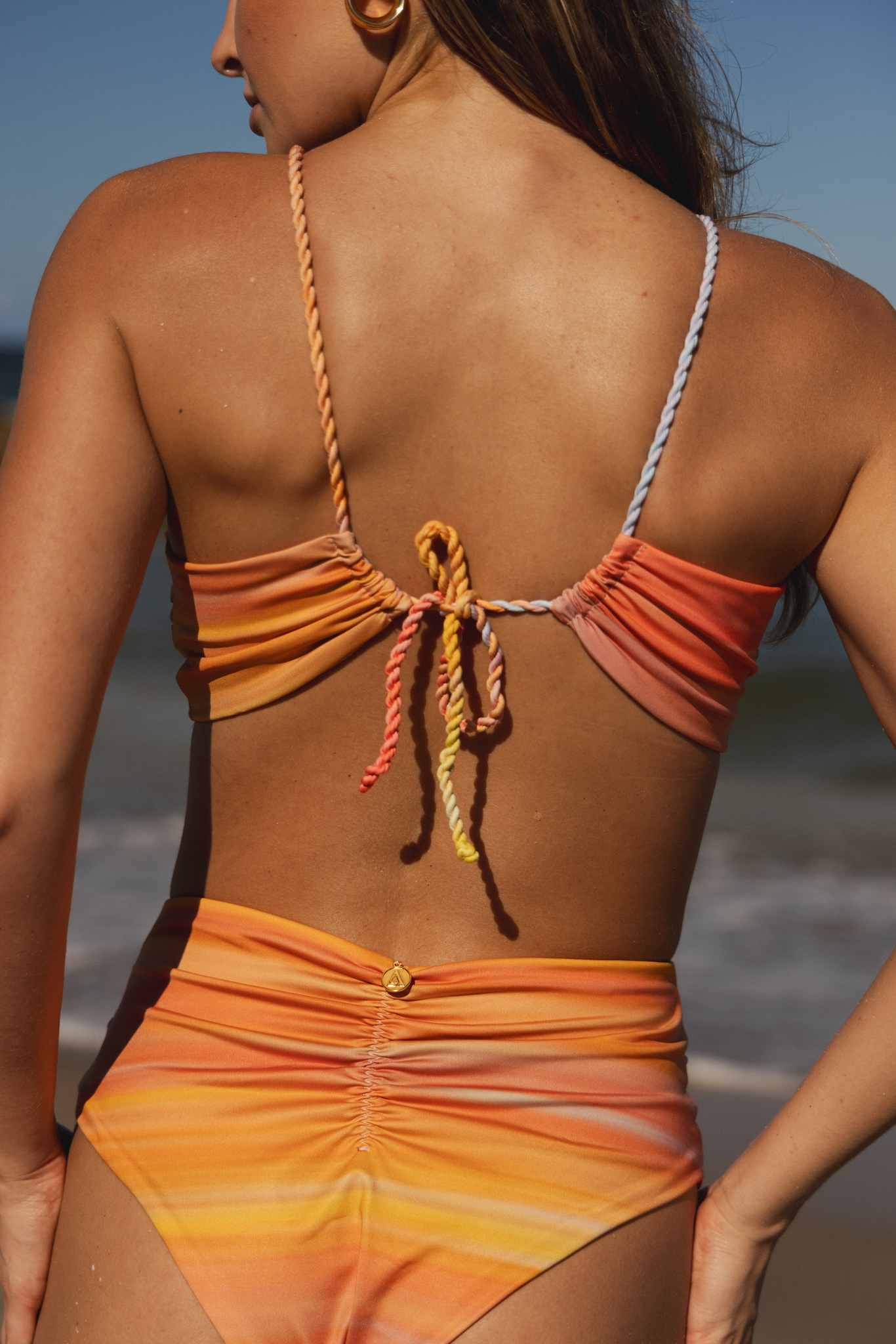 Back view of model in bikini