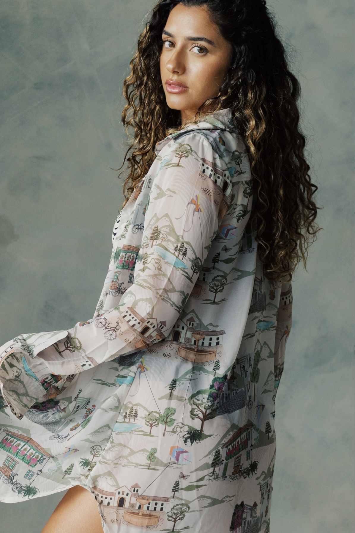 Model wearing beach shirt dress