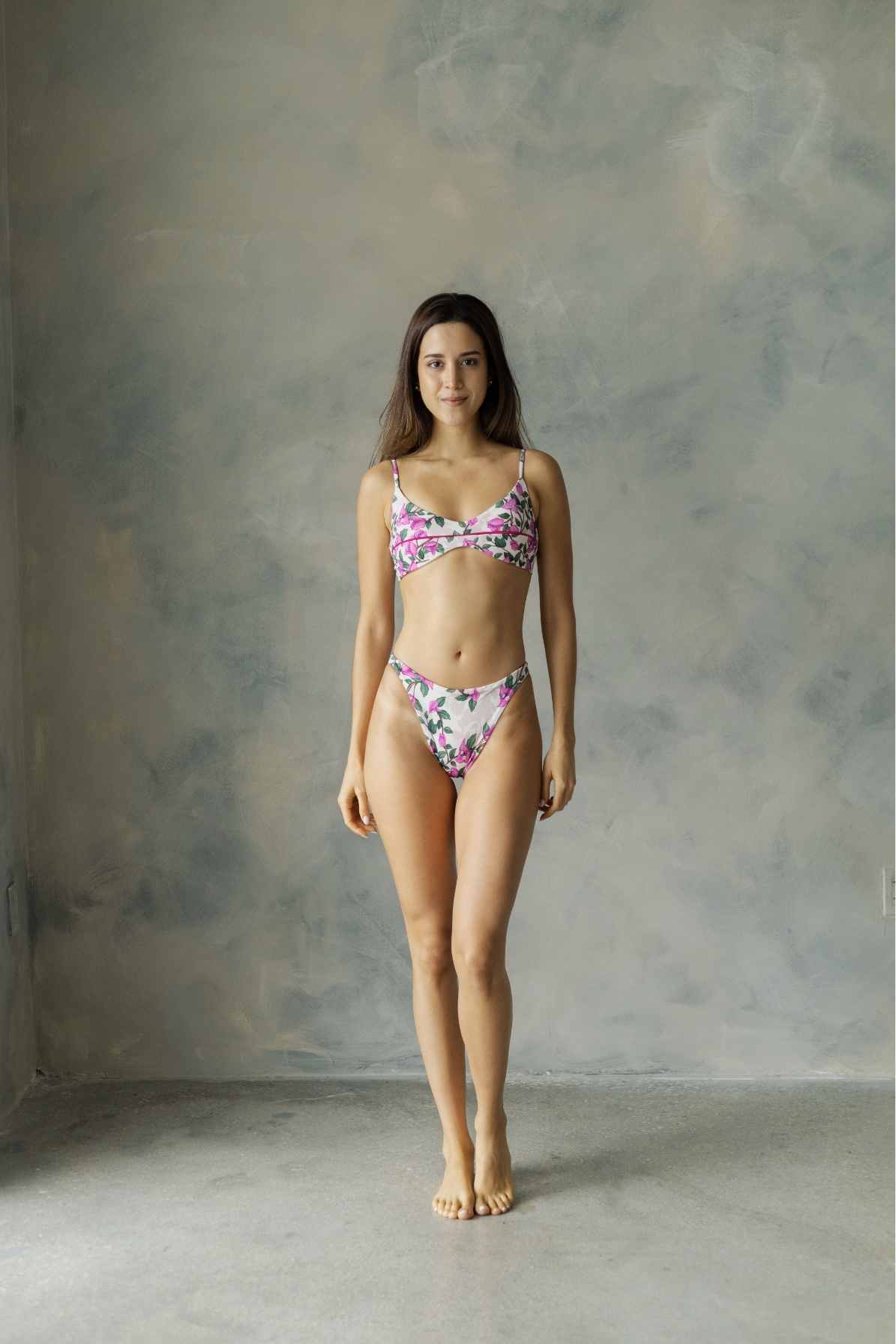 Model wearing floral bikini full front view