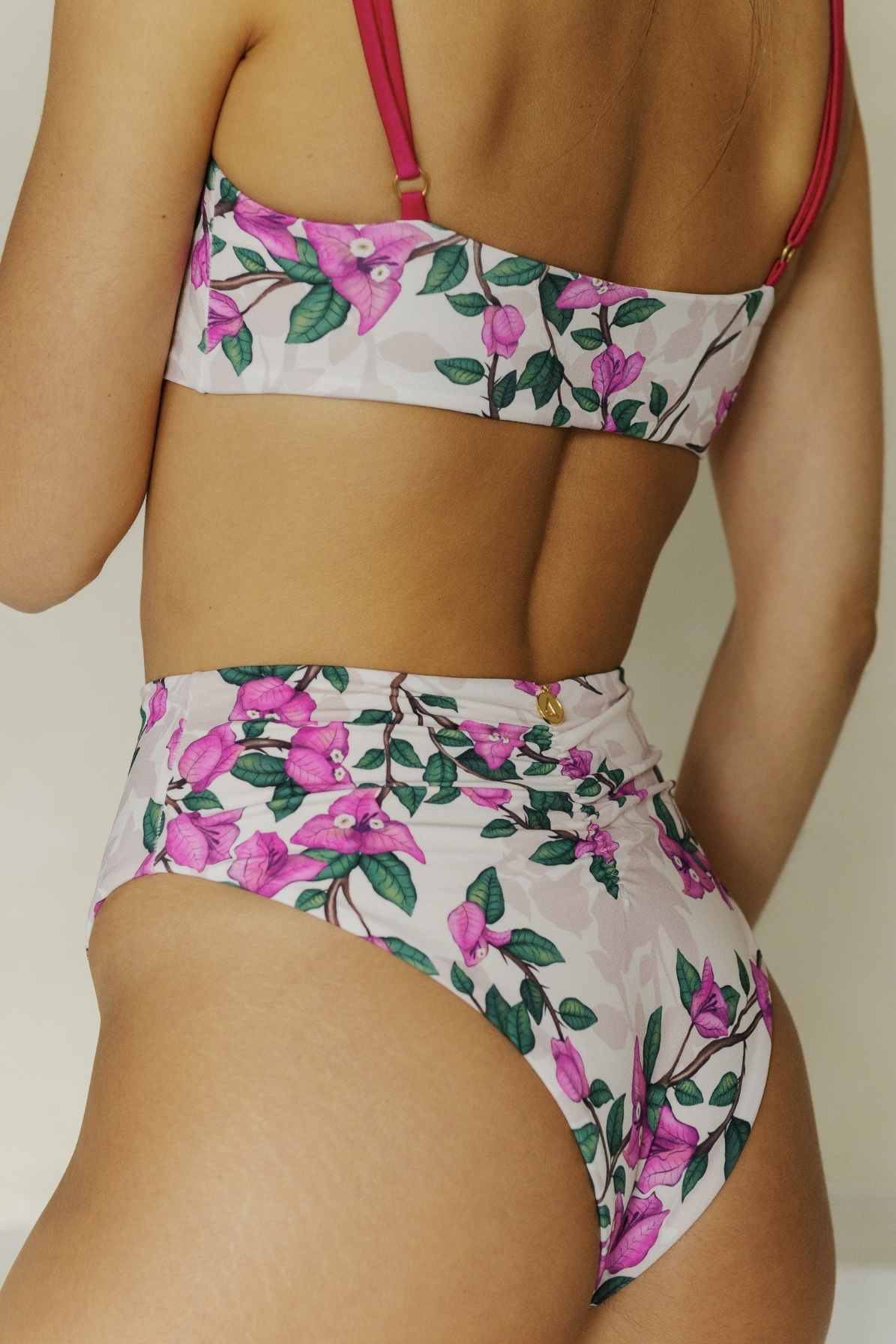 Side view of model wearing floral bikini